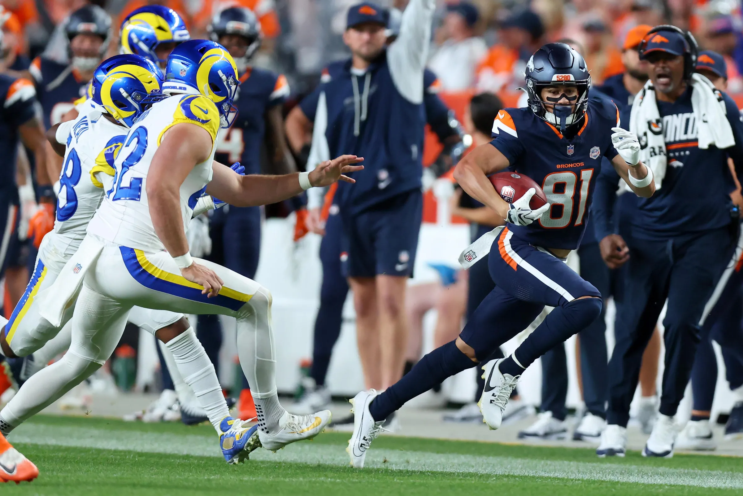 DENVER, COLORADO - SEPTEMBER 27: Kolbe Katsis #81 of the Denver Broncos returns a punt against the Los Angeles Rams during the third quarter at Empower Field At Mile High on September 27, 2026 in Denver, Colorado. (Photo by Justin Edmonds/Getty Images)