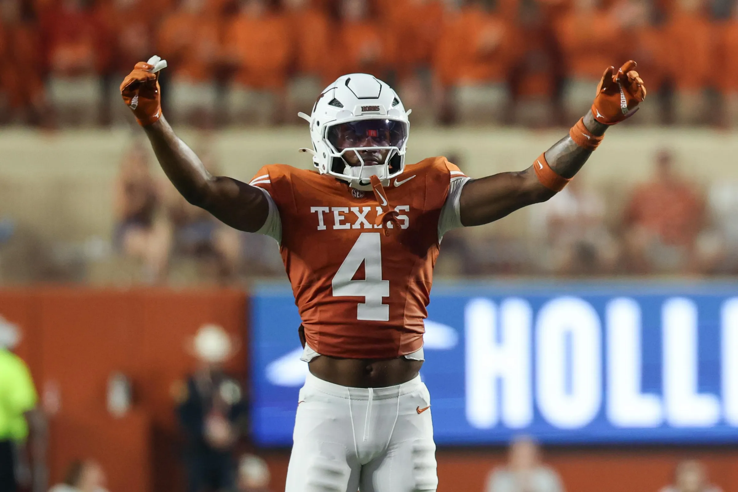 AUSTIN, TX - SEPTEMBER 19: Defensive back Jelani McDonald #4 of the Texas Longhorns raises his arms for the crowd during the college football game between the Texas Longhorns and UTSA Roadrunners on September 19, 2026, at Darrell K Royal-Texas Memorial Stadium in Austin, TX. (Photo by David Buono/Icon Sportswire via Getty Images)