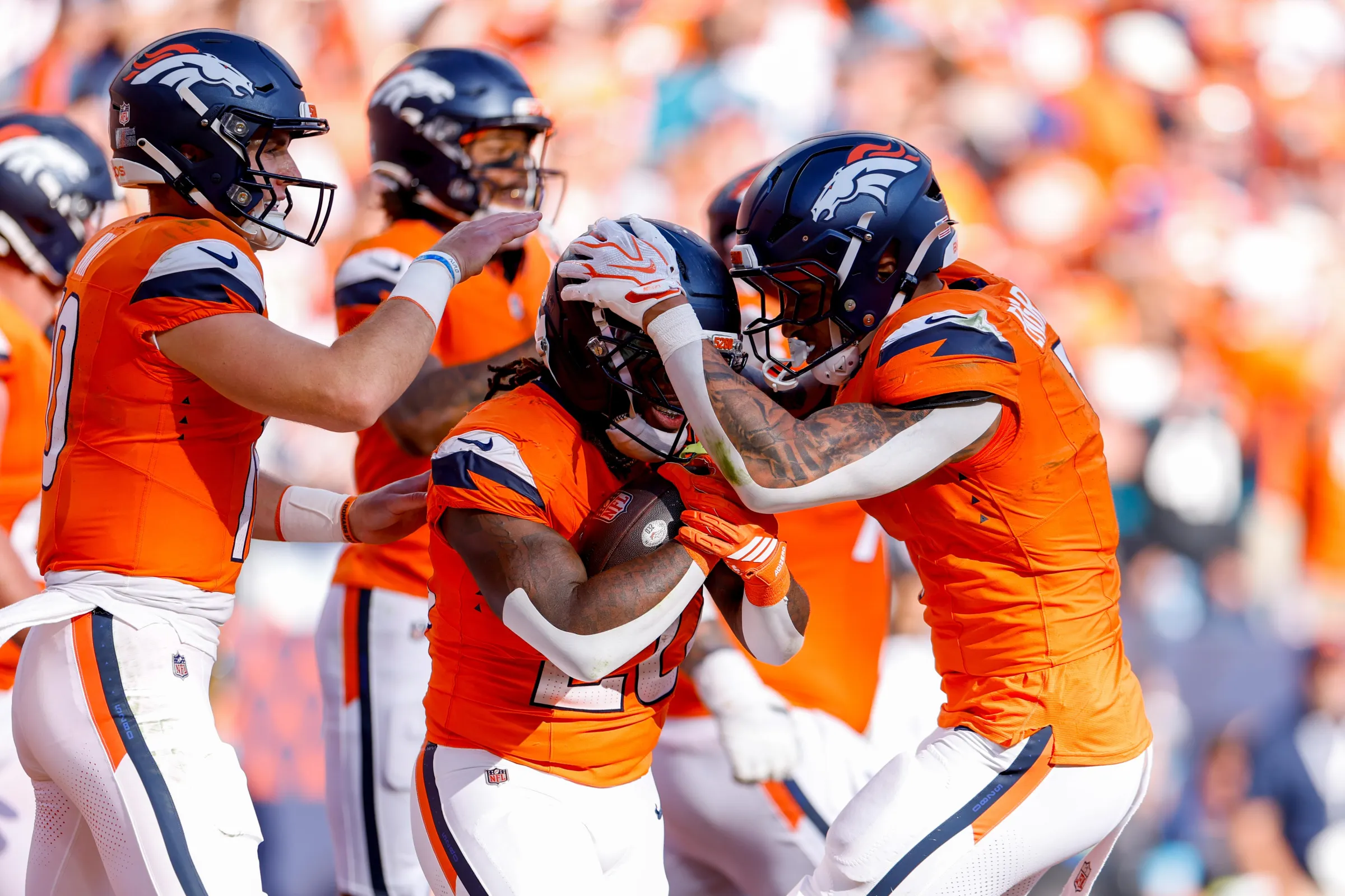 DENVER, COLORADO - SEPTEMBER 20: Jonah Coleman #20 of the Denver Broncos celebrates after scoring a touchdown in the fourth quarter of the game against the Jacksonville Jaguars at Empower Field At Mile High on September 20, 2026 in Denver, Colorado. (Photo by Lauren Leigh Bacho/Getty Images)