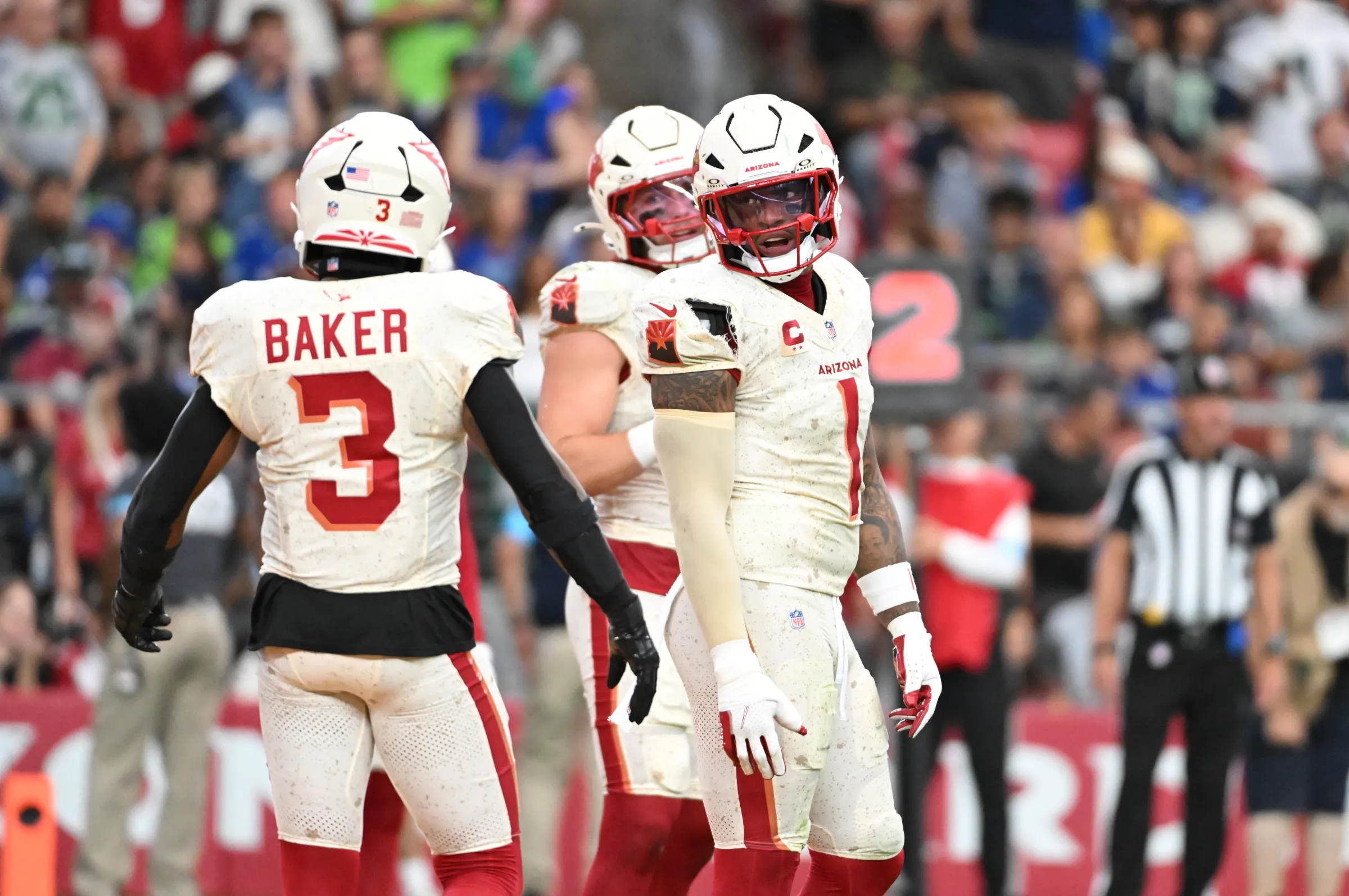 GLENDALE, ARIZONA - SEPTEMBER 20: Mack Wilson Sr #1 of the Arizona Cardinals talks to Budda Baker #3 during a stop play against the Seattle Seahawks at State Farm Stadium on September 20, 2026 in Glendale, Arizona. (Photo by Norm Hall/Getty Images)