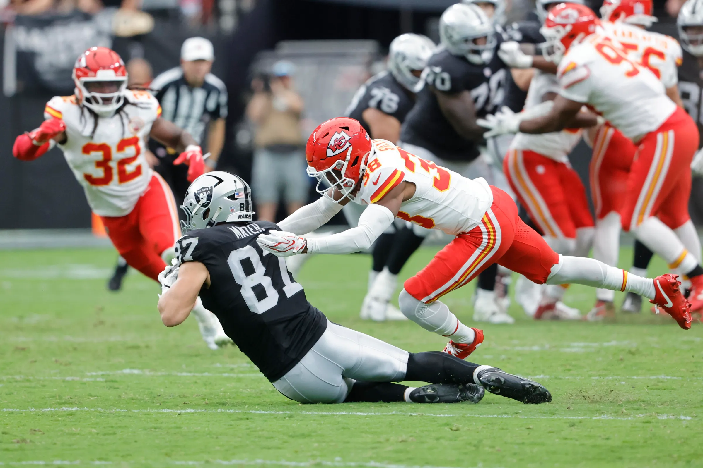 LAS VEGAS, NEVADA - OCTOBER 04: Michael Mayer #87 of the Las Vegas Raiders catches a pass against L'jarius Sneed #38 of the Kansas City Chiefs in the second quarter at Allegiant Stadium on October 04, 2026 in Las Vegas, Nevada. (Photo by Steve Marcus/Getty Images)