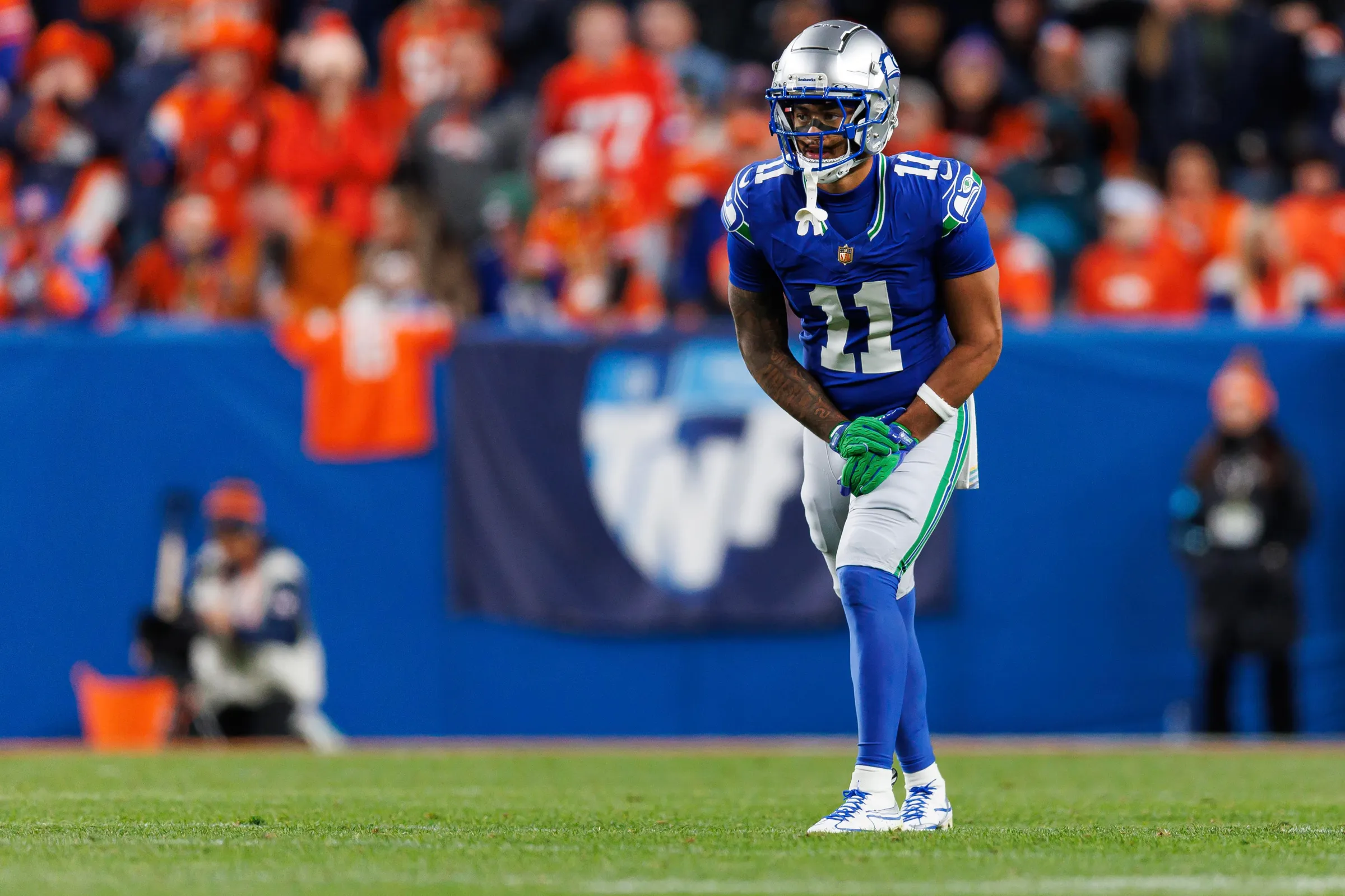 DENVER, COLORADO - OCTOBER 15: Jaxon Smith-Njigba #11 of the Seattle Seahawks is tackled during the third quarter of an NFL football game against the Denver Broncos at Empower Field at Mile High on October 15, 2026 in Denver, Colorado. (Photo by Brooke Sutton/Getty Images)