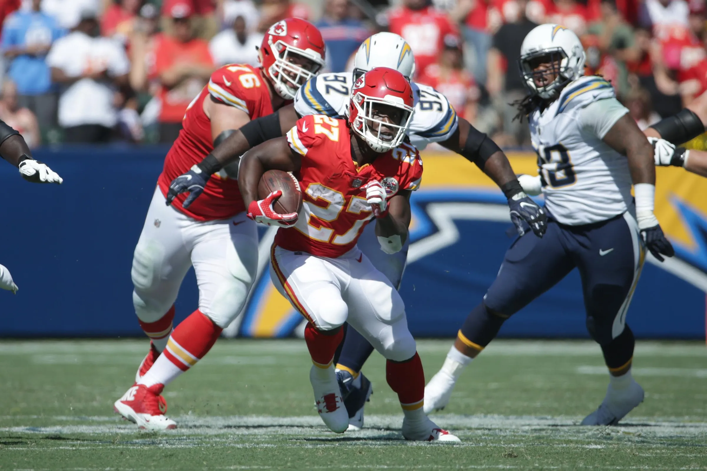 CARSON, CA - SEPTEMBER 24: Kareem Hunt #27 of the Kansas City Chiefs runs the ball during the game against the Los Angeles Chargers at StubHub Center on September 24, 2017 in Carson, California. (Photo by Jeff Gross/Getty Images)